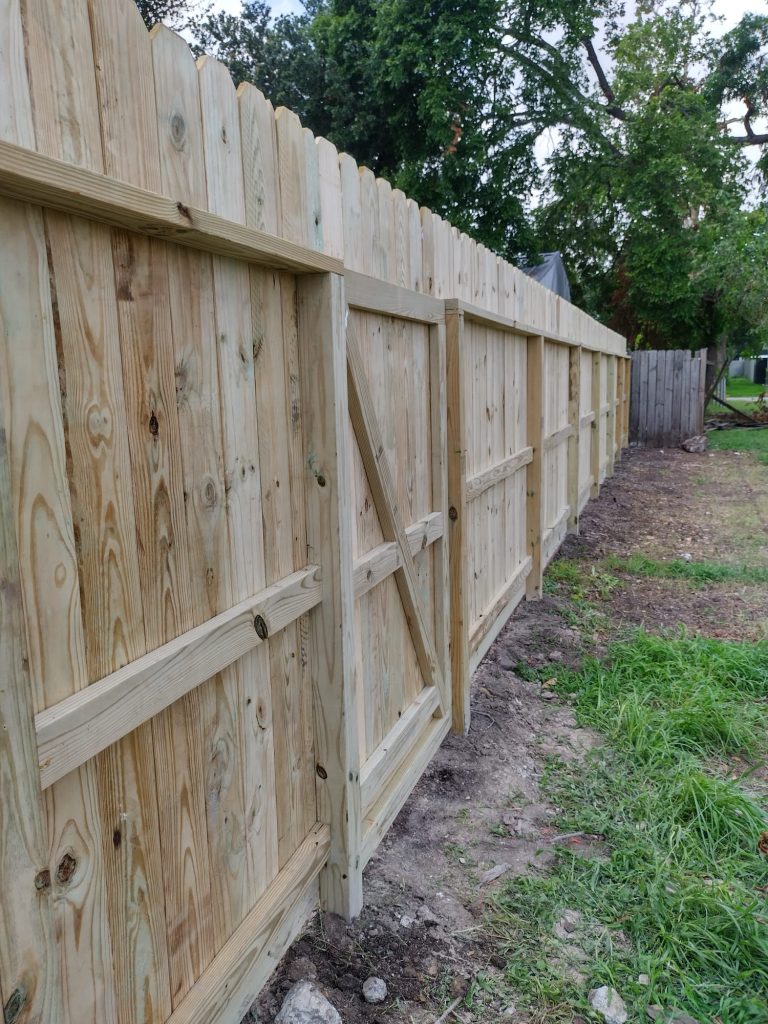 Building a Wooden Fence for His Houston Home