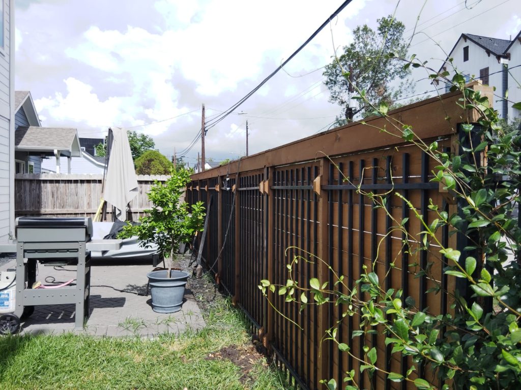 Repairing 49-Foot Wood + Iron Fence in Houston Texas